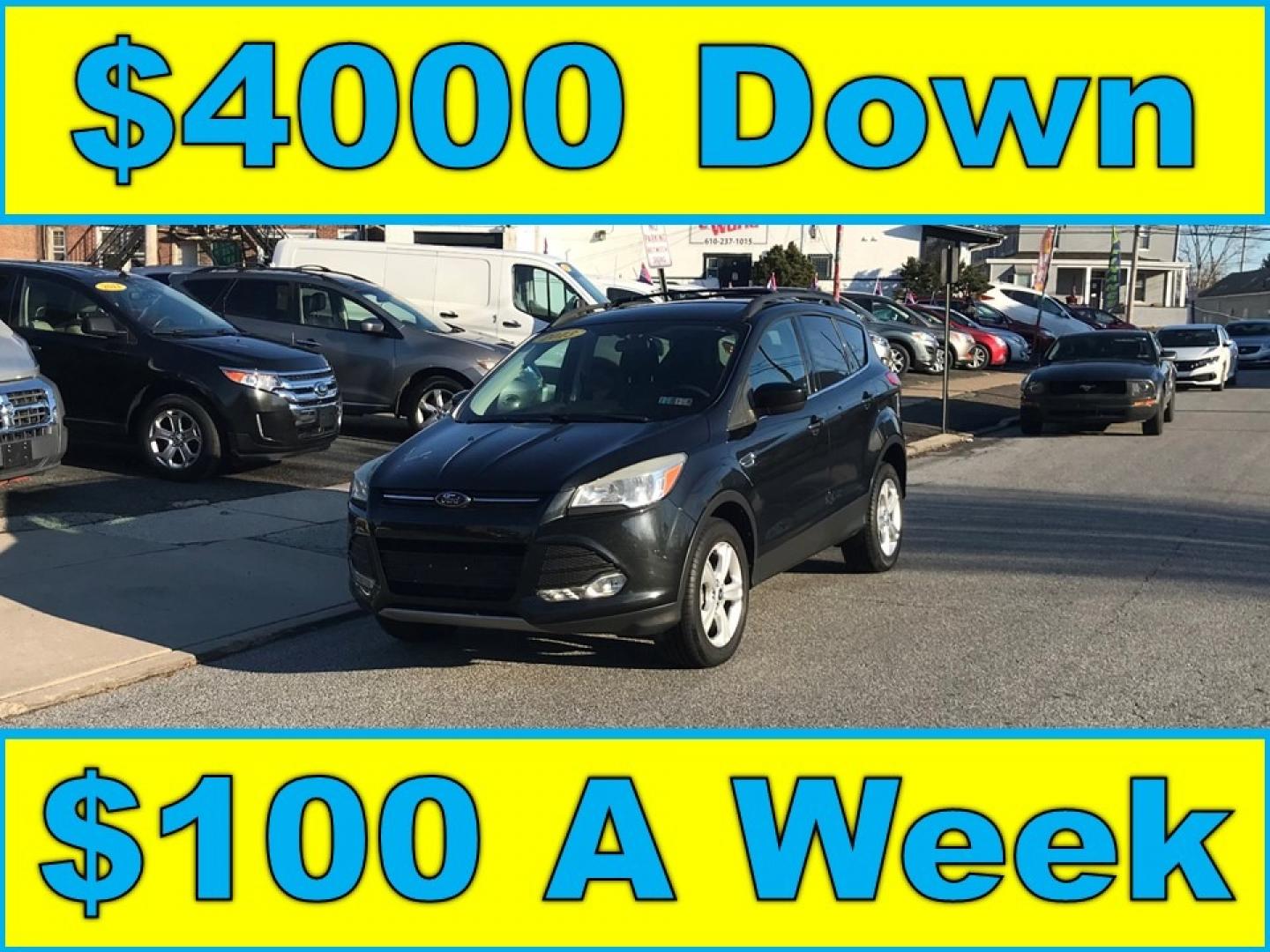 2013 Black /Black Ford Escape SE (1FMCU9G93DU) with an 2.0 V4 engine, Automatic transmission, located at 577 Chester Pike, Prospect Park, PA, 19076, (610) 237-1015, 39.886154, -75.302338 - Photo#0